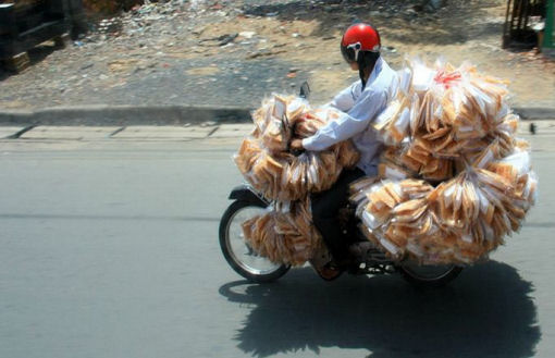 Le moto nella vita quotidiana in Vietnam Le moto nella vita quotidiana in Vietnam